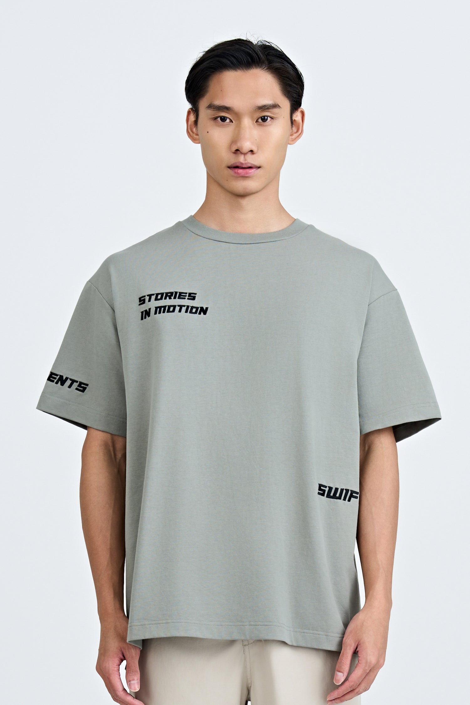 "Stories In Motion" Embroidery Tee - Dark Grey