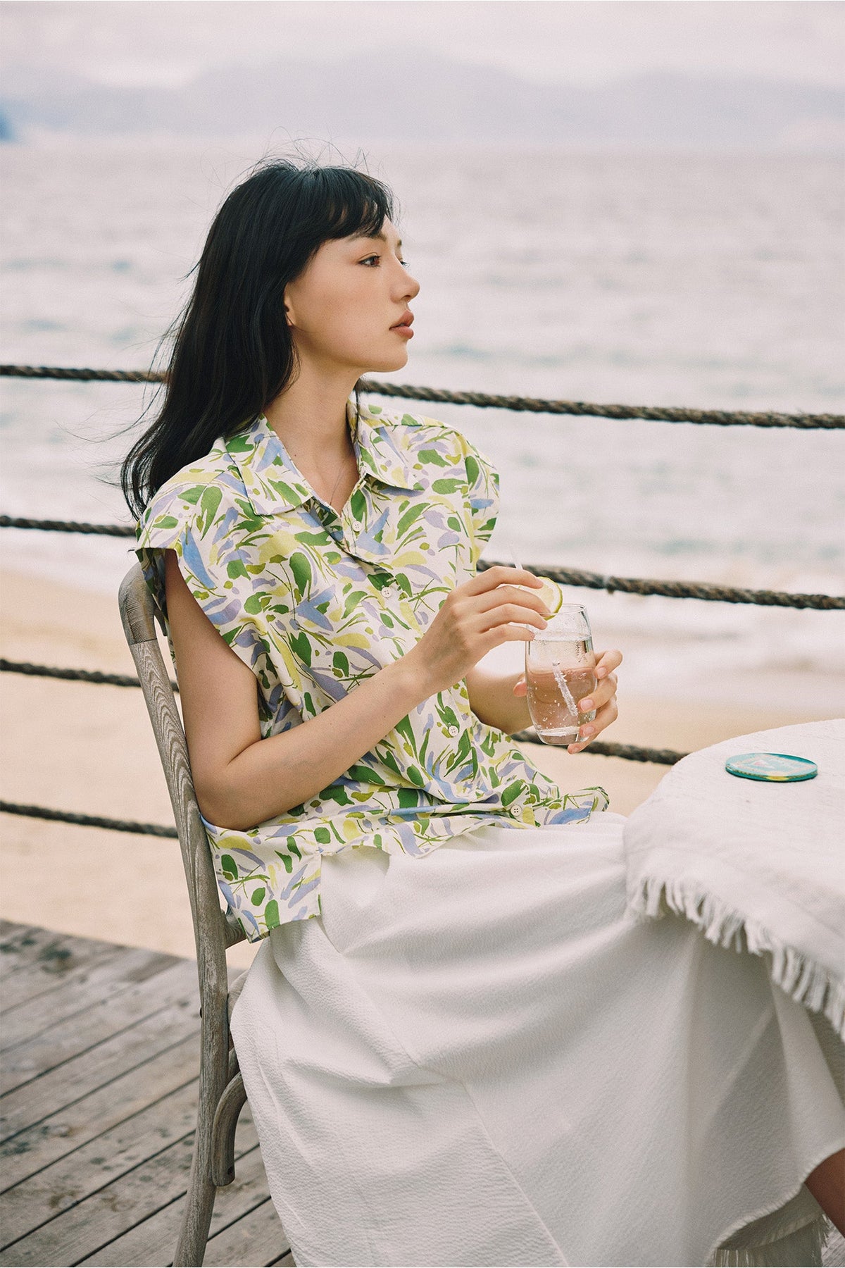 The lime floral blouse over the ruche waistband skirt.